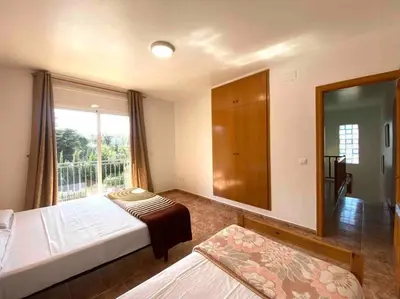 Cama o camas de una habitación en Villa with private pool and BBQ near Lloret de Mar