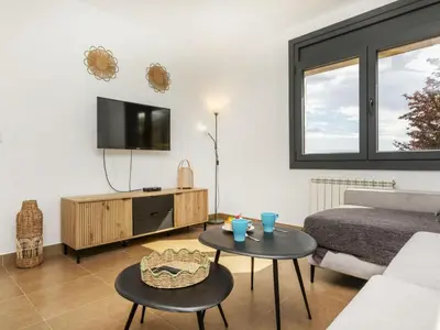 Una televisión o centro de entretenimiento en Holiday Home Selvamar by Interhome