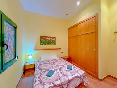 Cama o camas de una habitación en Vivalidays Casa Palamos - Costa Brava