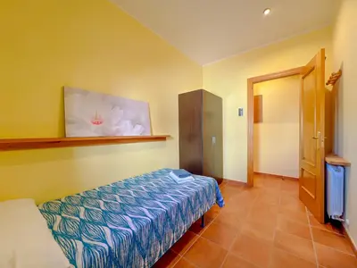 Cama o camas de una habitación en Vivalidays Casa Palamos - Costa Brava