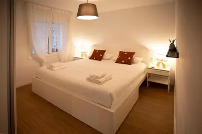 Cama o camas de una habitación en Flateli Portal Nou