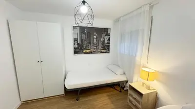 Cama o camas de una habitación en Flateli Portal Nou