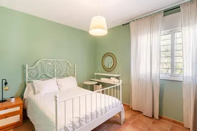 Cama o camas de una habitación en Villa Paraíso