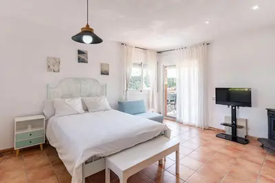 Una televisión o centro de entretenimiento en Villa Paraíso