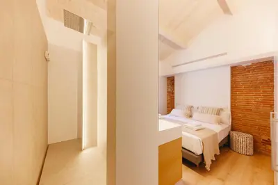 Cama o camas de una habitación en Bravissimo Ballesteries Penthouse, Monthly Apartment