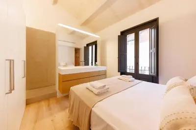 Cama o camas de una habitación en Bravissimo Ballesteries Penthouse, Monthly Apartment