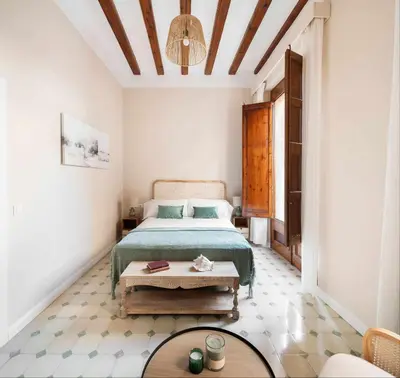 Cama o camas de una habitación en Casa familiar junto al mar en Arenys de Mar