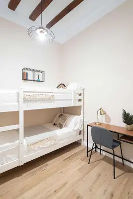 Cama o camas de una habitación en Casa familiar junto al mar en Arenys de Mar
