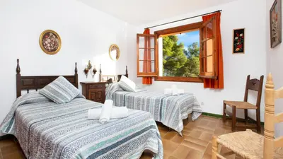 Cama o camas de una habitación en 1Esquer01