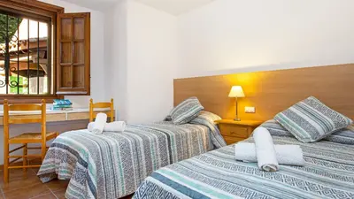 Cama o camas de una habitación en 1Esquer01