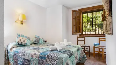 Cama o camas de una habitación en 1Esquer01