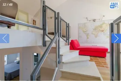 Cama o camas de una habitación en Casa Mendi en Lloret de Mar