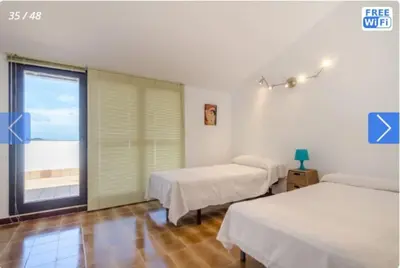 Cama o camas de una habitación en Casa Mendi en Lloret de Mar