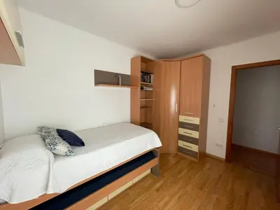 Cama o camas de una habitación en Apartamento céntrico cerca de la playa