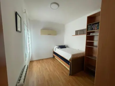 Cama o camas de una habitación en Apartamento céntrico cerca de la playa