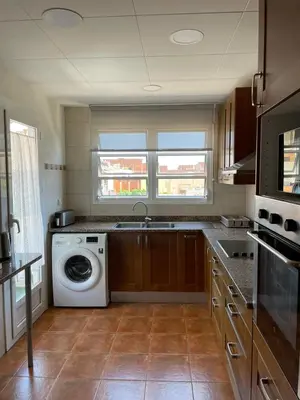 Una cocina o zona de cocina en Apartamento céntrico cerca de la playa