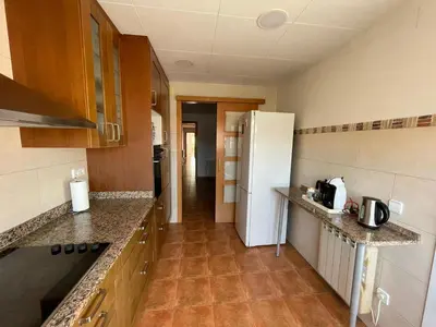 Una cocina o zona de cocina en Apartamento céntrico cerca de la playa