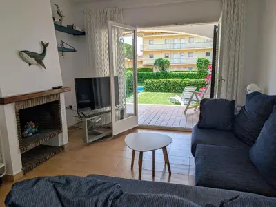 Una televisión o centro de entretenimiento en Apartamento Playa