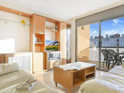 Una televisión o centro de entretenimiento en 0330 Apartment in Lloret de Mar