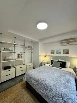 Cama o camas de una habitación en Private terrace 1BR apt - 4min walk to the beach