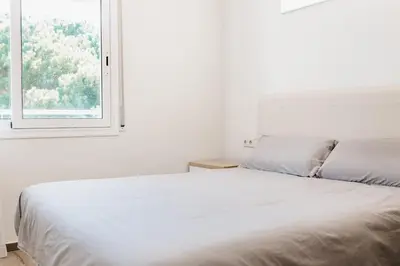 Cama o camas de una habitación en Hauzify I Apartament Arroyo