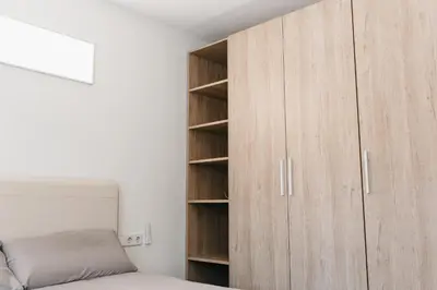 Cama o camas de una habitación en Hauzify I Apartament Arroyo