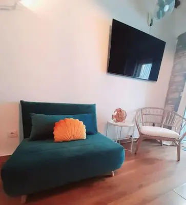 Zona de estar de Bonito estudio en el centro. Ideal parejas.