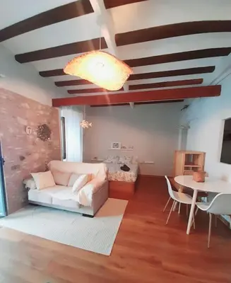 Zona de estar de Bonito estudio en el centro. Ideal parejas.