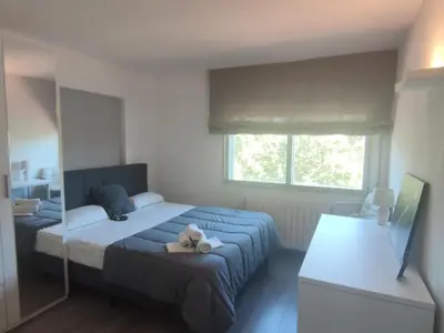 Cama o camas de una habitación en Apartamento Moderno en el Centro de Platja d'Aro - Cerca de la Playa y Parking Incluido - ES-209-54