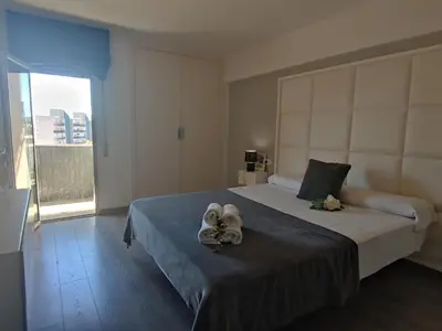 Cama o camas de una habitación en Apartamento Moderno en el Centro de Platja d'Aro - Cerca de la Playa y Parking Incluido - ES-209-54