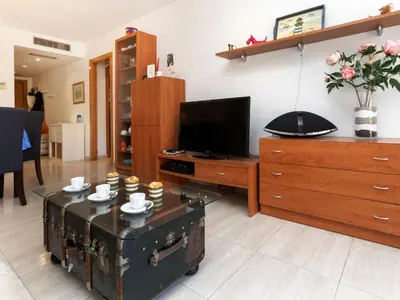 Una televisión o centro de entretenimiento en Apartment El Moli by Interhome