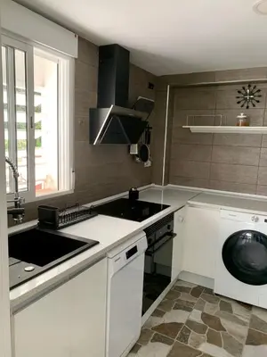Una cocina o zona de cocina en Puig comfort