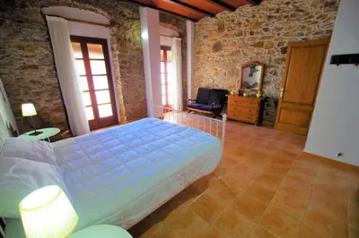 Cama o camas de una habitación en V&V LLORET- Villa Cal Miquel