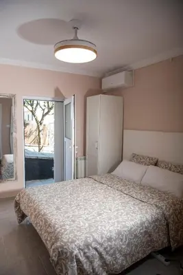 Cama o camas de una habitación en Villa Serenity Climate Pool & Panoramic Sea Views