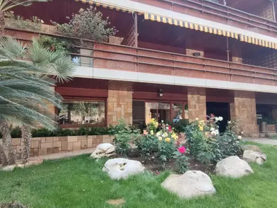Jardín al aire libre en Apartamento Cómodo con Terraza y Parking cerca de la Playa para 4 Personas - ES-209-25