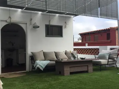 Zona de estar de CA LA NONA Centro de Palamós A 100 m de la playa Parking incluido