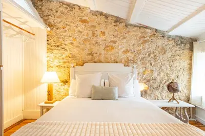 Cama o camas de una habitación en casa con encanto en el bosque y a 10 min de Girona