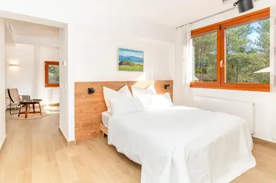 Cama o camas de una habitación en Gallinero - Familienfreundliches Appartment in Katalanischer Masia