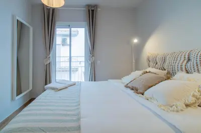 Cama o camas de una habitación en Budget Beach Studio 23