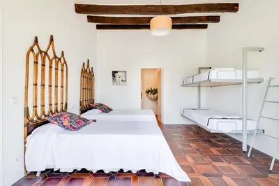 Cama o camas de una habitación en Vistas panorámicas, piscina, frente al mar