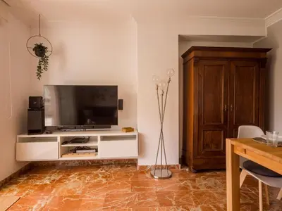 Una televisión o centro de entretenimiento en Apartamento en Cala Cristus