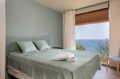Cama o camas de una habitación en VILLA ILLA BLANCA
