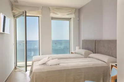 Cama o camas de una habitación en VILLA ILLA BLANCA