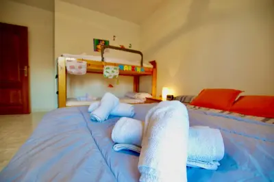 Cama o camas de una habitación en V&V LLORET- Villa Aurora