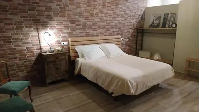 Cama o camas de una habitación en CAN PLANAS , Estudio Familiar