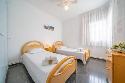 Cama o camas de una habitación en HomeHolidaysRentals Himalaia - Costa Barcelona
