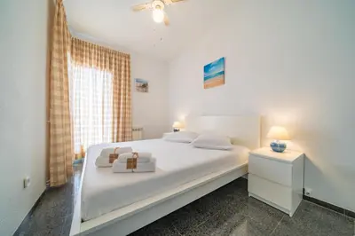 Cama o camas de una habitación en HomeHolidaysRentals Himalaia - Costa Barcelona