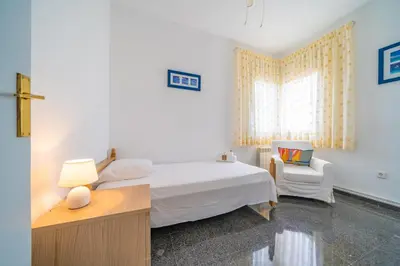 Cama o camas de una habitación en HomeHolidaysRentals Himalaia - Costa Barcelona
