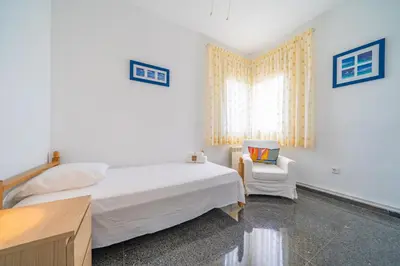 Cama o camas de una habitación en HomeHolidaysRentals Himalaia - Costa Barcelona