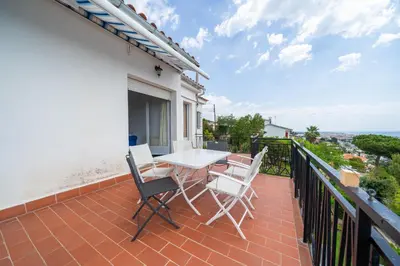 Un balcón o terraza de HomeHolidaysRentals Himalaia - Costa Barcelona